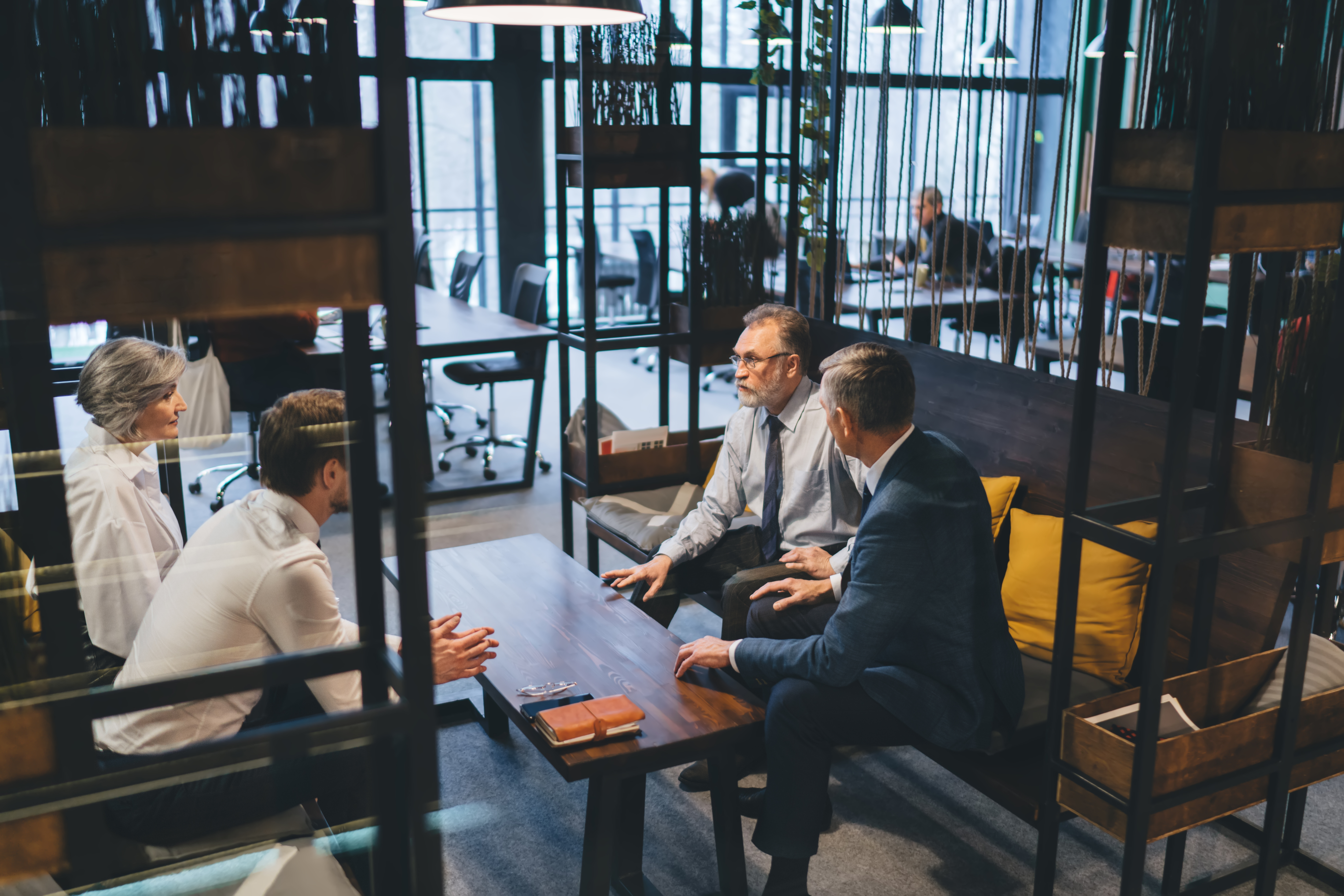 colleagues having business meeting on couch in off 2026 01 09 08 27 39 utc.jpg